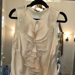 Ruffle front sleeveless blouse